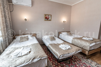Гостиница "Маданур": Трехместный номер - двуспалка и одноместная кровати, другое расположение