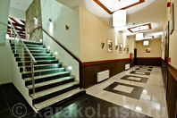 Отель Каприз-Каракол: Первый этаж, коридор, лестница на этажи